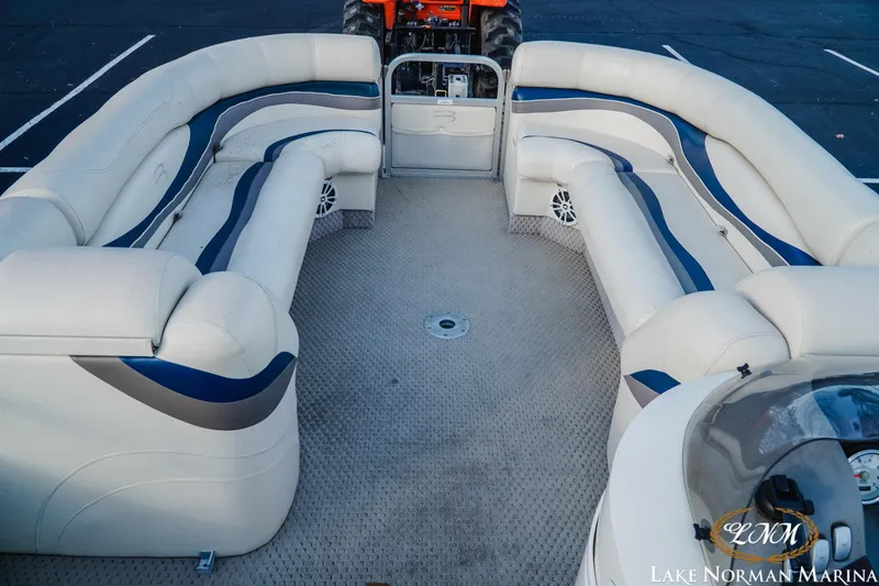 Slide: The Image of 2006 Bennington 2275 RL pontoon boat interior with spacious seating at Lake Norman Marina. - 9