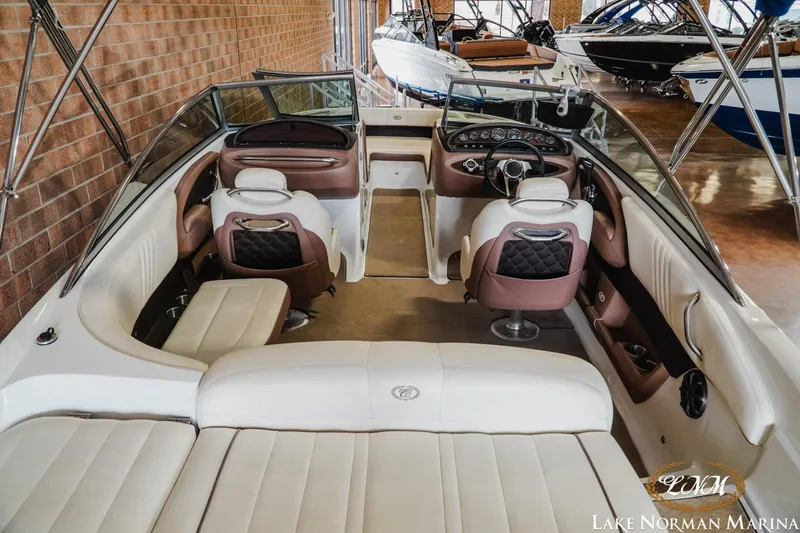 Slide: The Image of 2013 Cobalt 232 boat interior with luxurious seating at Lake Norman Marina. - 8