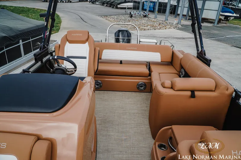 Slide: The Image of 2023 Harris FloteBote 230 Solstice pontoon boat interior with tan seating at Lake Norman Marina. - 14