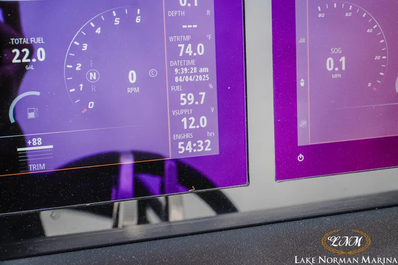 Slide: The Image of Dashboard of 2023 Harris FloteBote 230 Solstice showing fuel and engine data. - 17