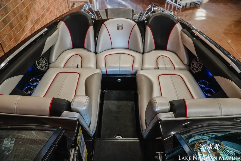 Slide: The Image of 2014 MasterCraft X-Star interior with sleek leather seating and modern design. - 14