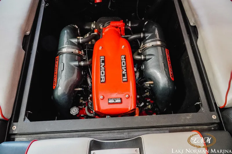 Slide: The Image of 2014 MasterCraft X-Star engine with Ilmor branding, showcased at Lake Norman Marina. - 20