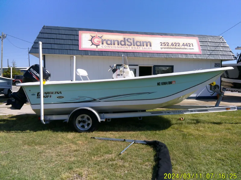 Slide: The Image of 2012 Carolina Skiff 198 DLV boat on trailer at Grand Slam Consignment Boat Sales. - 0