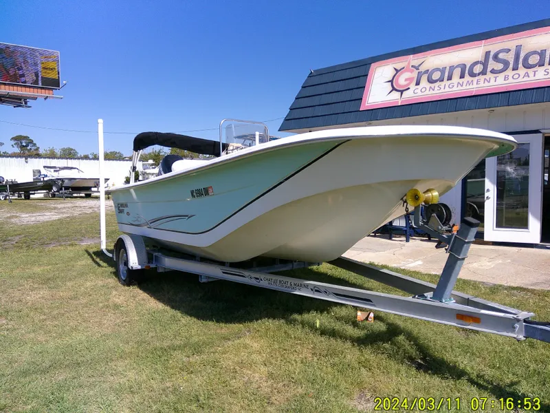 Slide: The Image of 2012 Carolina Skiff 198 DLV boat on trailer outside Grand Slam Consignment Boats. - 4
