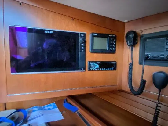 Slide: The Image of Navigation equipment on a 2000 J Boats J/46 yacht, featuring B&G displays and communication devices. - 18
