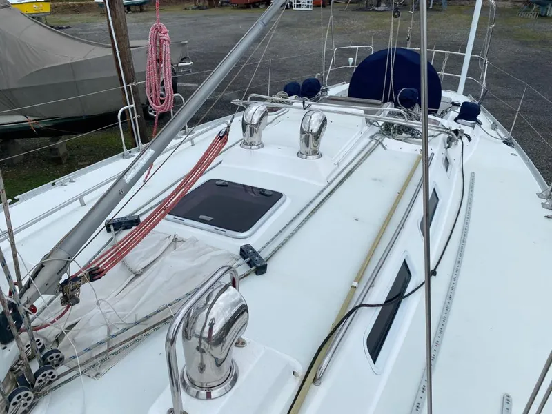Slide: The Image of Deck view of 2000 J Boats J/46 sailboat, featuring winches and rigging. - 49