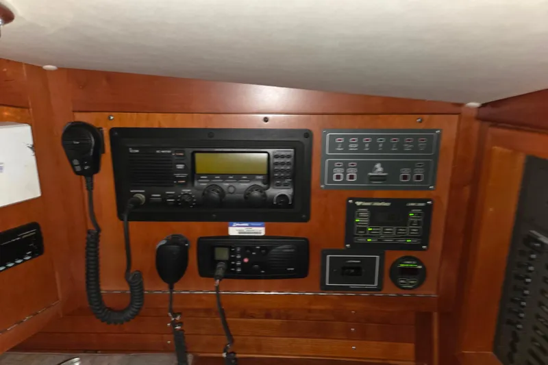 Slide: The Image of Control panel of a 2000 J Boats J/46 yacht with communication equipment. - 74