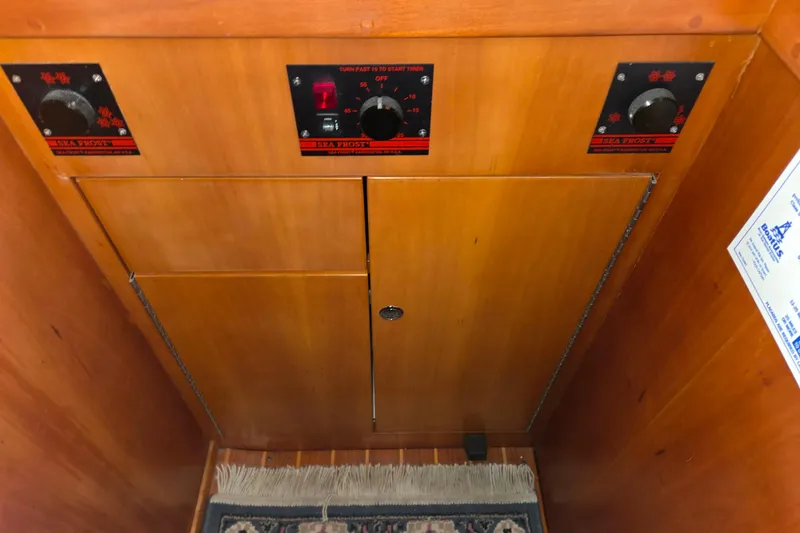 Slide: The Image of Wooden interior of a 2000 J Boats J/46 with Sea Frost controls. - 80