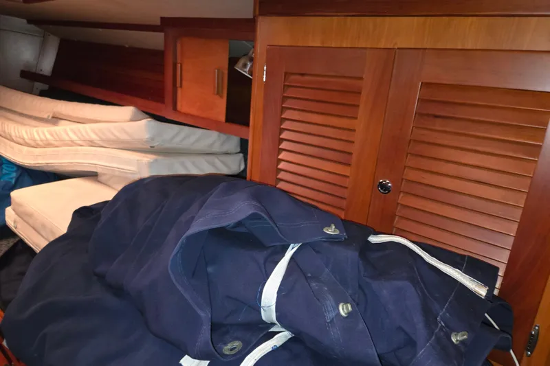 Slide: The Image of Interior of 2000 J Boats J/46 with cushions and navy sailcloth. - 82