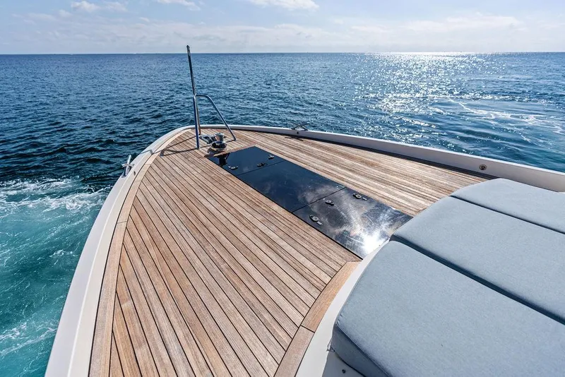 Slide: The Image of 2018 Delta Powerboats 54 IPS yacht deck with ocean view and sunny skies. - 23