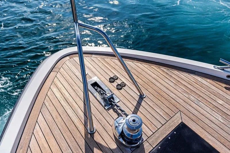 Slide: The Image of 2018 Delta Powerboats 54 IPS deck with teak finish and ocean view. - 24