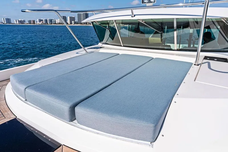 Slide: The Image of 2018 Delta Powerboats 54 IPS yacht with spacious sunbathing deck, ocean view in background. - 26