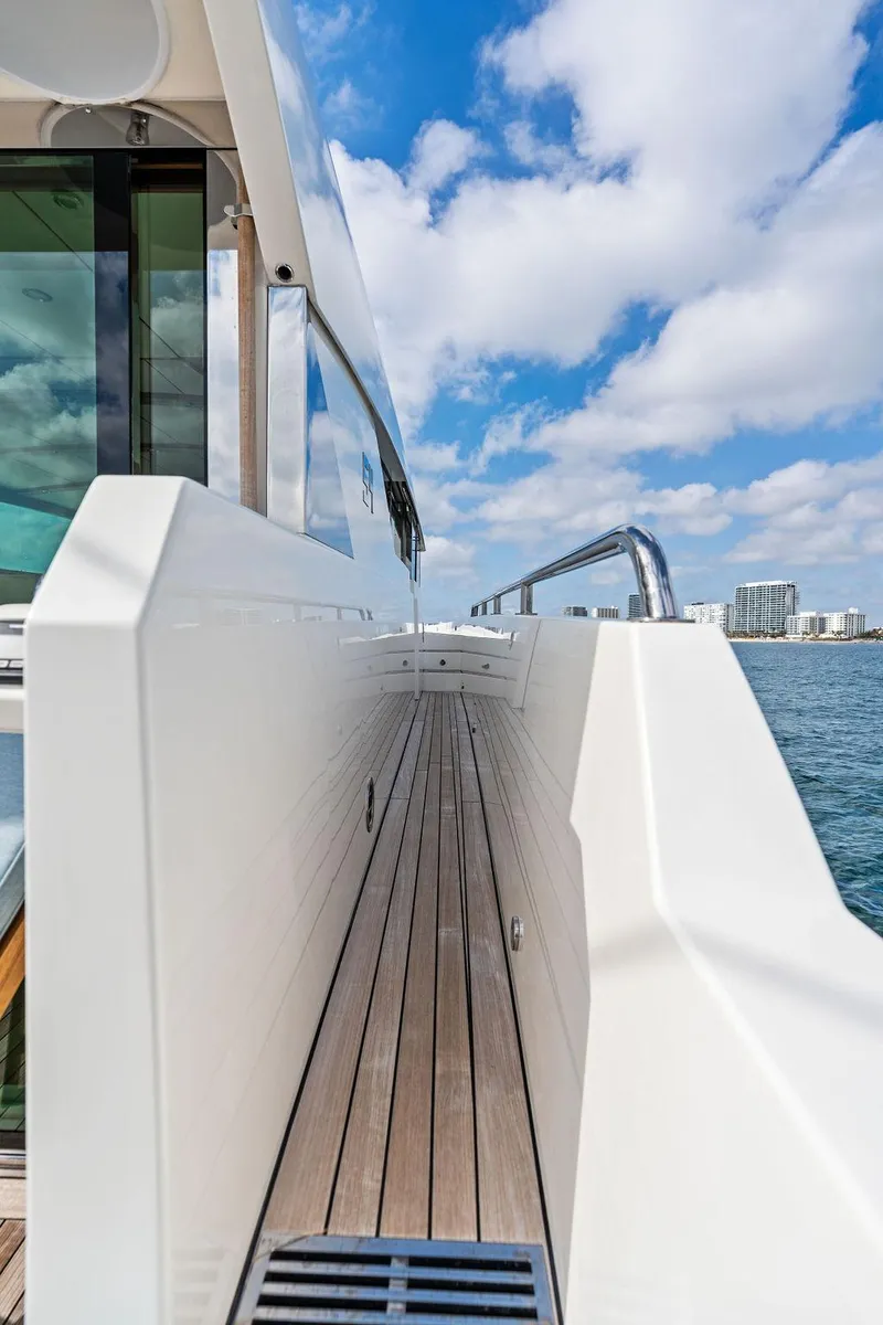 Slide: The Image of 2018 Delta Powerboats 54 IPS yacht deck with ocean view and blue sky. - 34