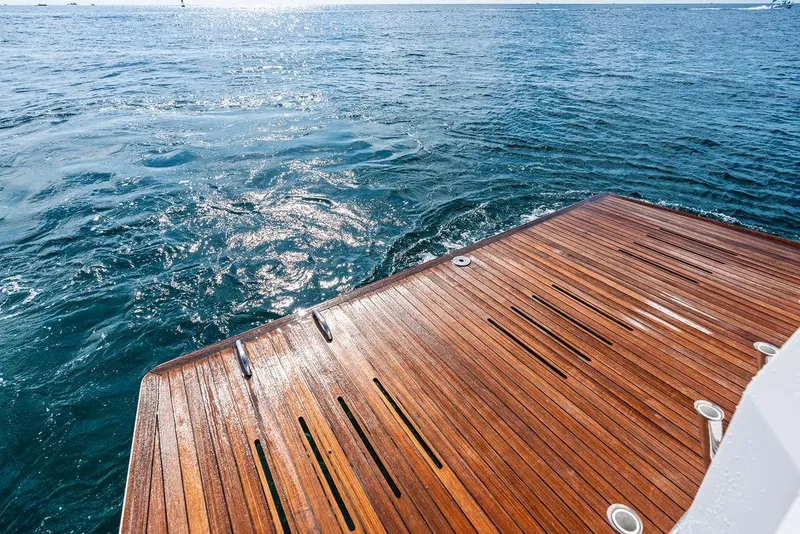 Slide: The Image of Teak deck of 2018 Delta Powerboats 54 IPS overlooking ocean waters. - 36