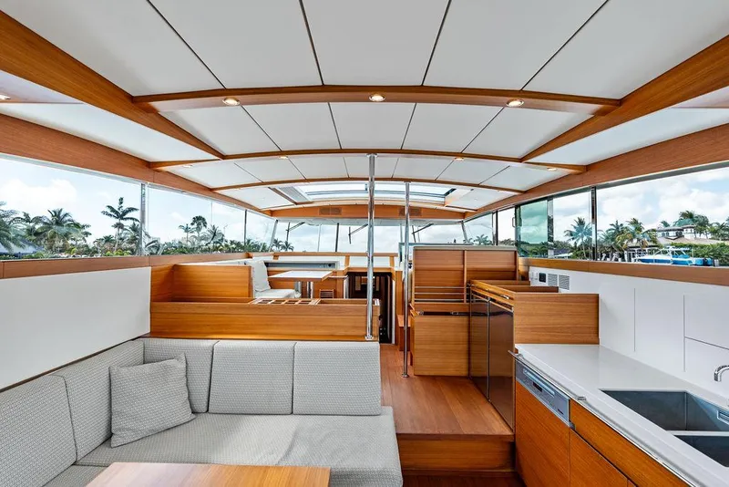 Slide: The Image of Interior of 2018 Delta Powerboats 54 IPS, featuring modern wood and white design. - 37