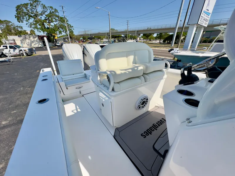 Slide: The Image of 2023 Everglades 273 Center Console boat interior with seating and console features. - 22