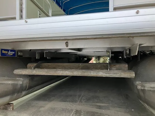 Slide: The Image of Underneath view of a 2017 Godfrey Sweetwater 2286 C pontoon boat with Sea-Legs system. - 13