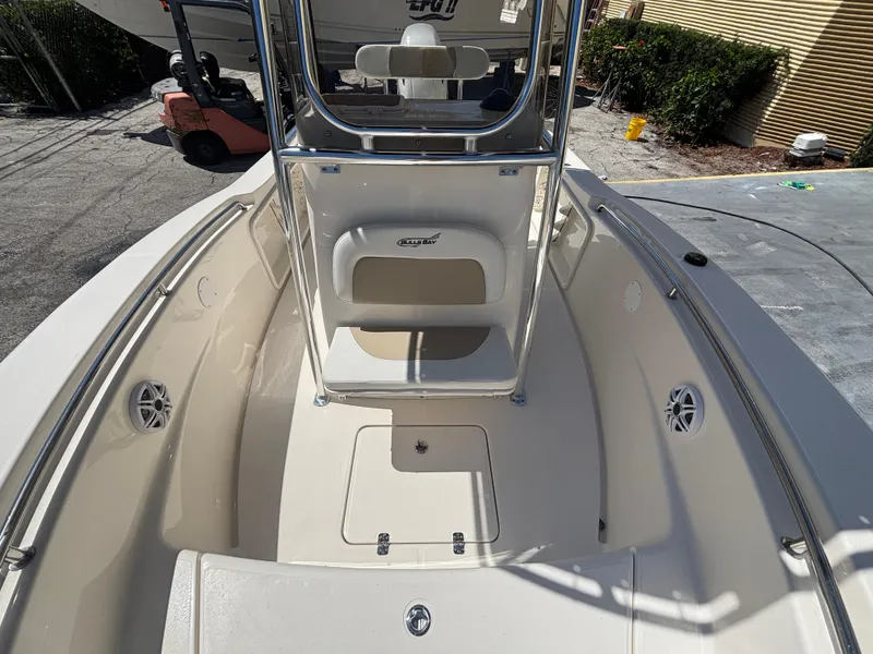Slide: The Image of 2025 Bulls Bay 200 Center Console boat interior with seating and storage compartments. - 11
