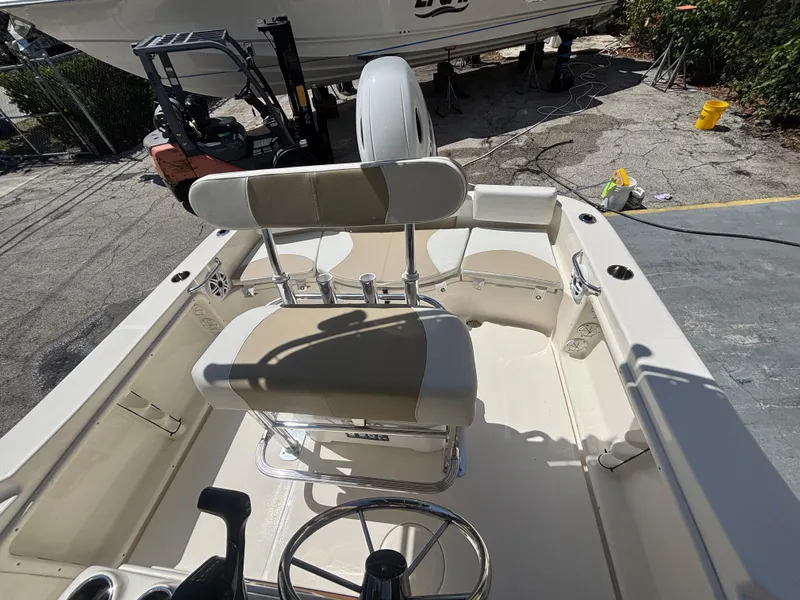 Slide: The Image of 2025 Bulls Bay 200 Center Console boat interior with seating and steering wheel. - 15