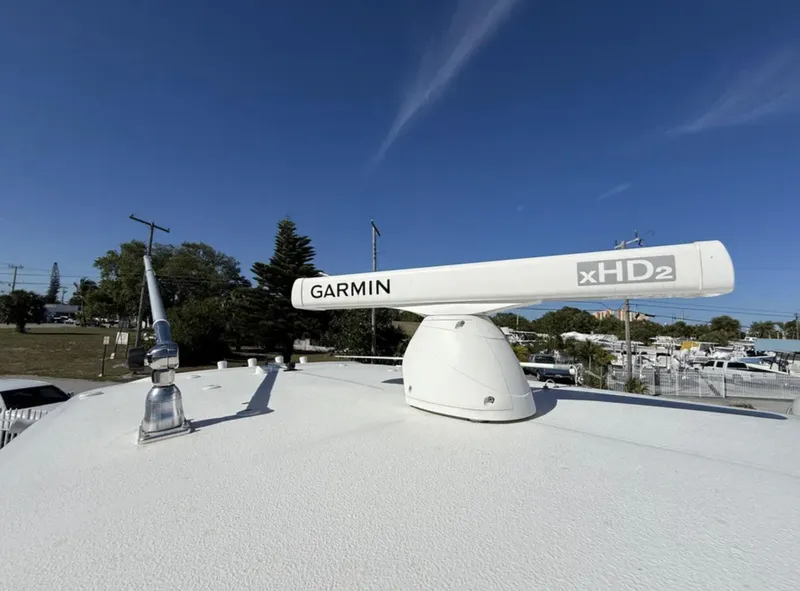 Slide: The Image of Garmin xHD2 radar on 2021 Sea Hunt Gamefish 30 boat, clear sky background. - 10