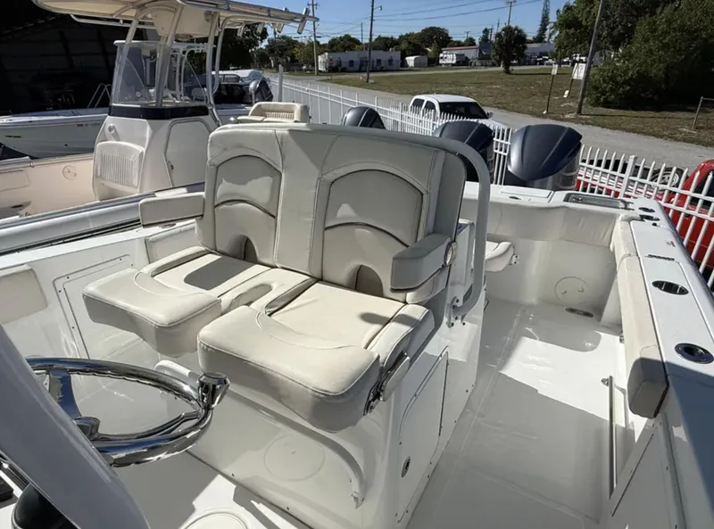 Slide: The Image of 2021 Sea Hunt Gamefish 30 Forward Seating boat interior with dual cushioned seats. - 15