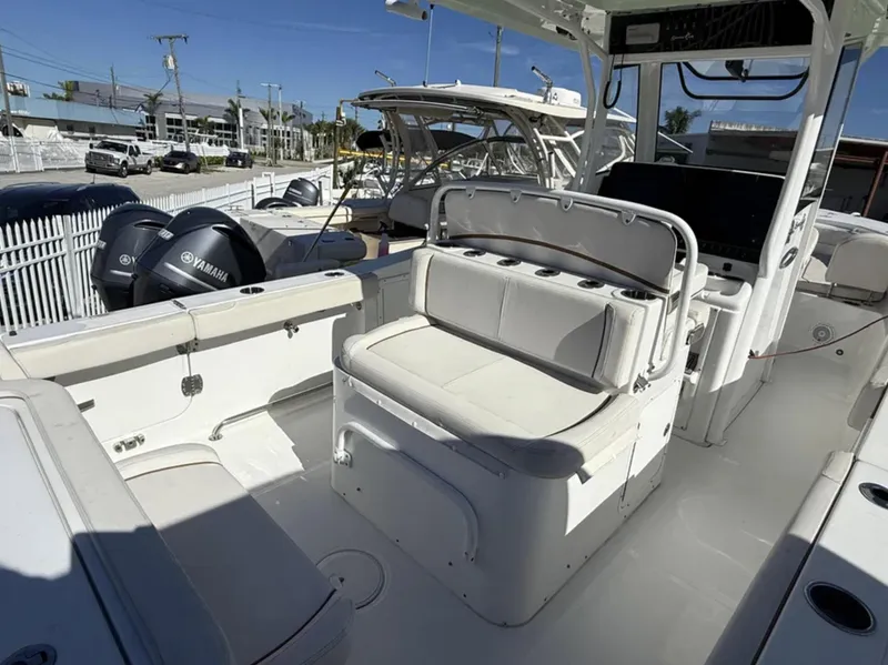 Slide: The Image of 2021 Sea Hunt Gamefish 30 boat with forward seating and Yamaha engines. - 19