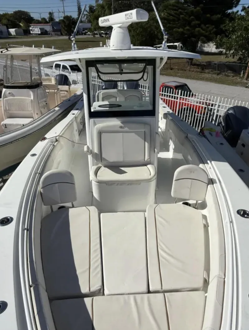 Slide: The Image of 2021 Sea Hunt Gamefish 30 Forward Seating boat with spacious deck and modern design. - 25
