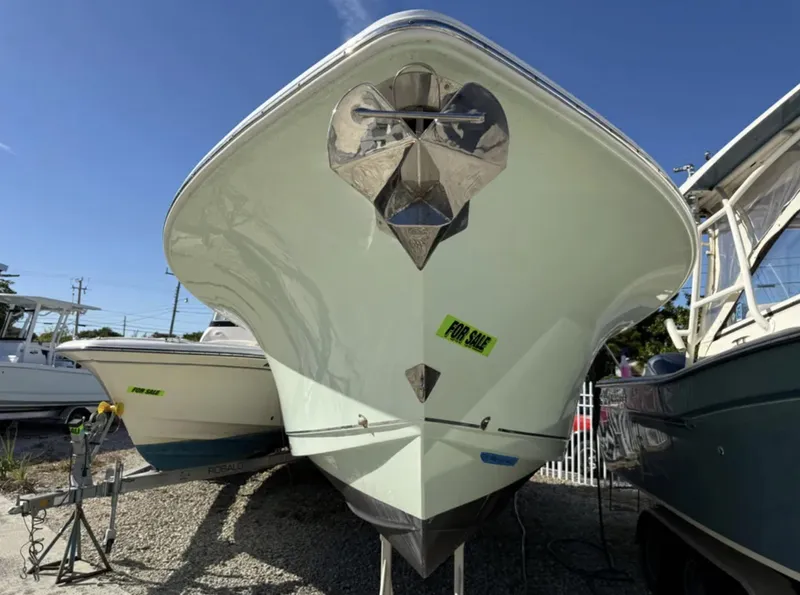 Slide: The Image of 2021 Sea Hunt Gamefish 30 boat with forward seating, for sale, docked outdoors. - 3