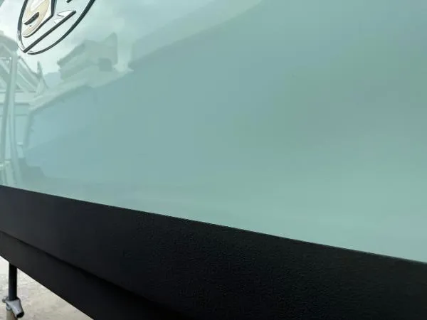 Slide: The Image of 2021 Sea Hunt Gamefish 30 boat hull, close-up view, showcasing sleek design. - 37