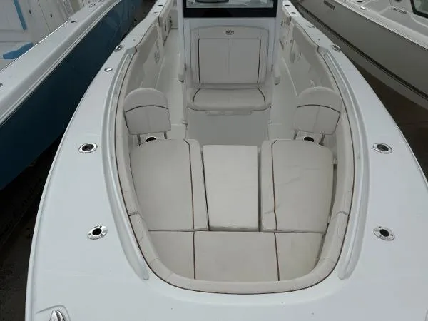 Slide: The Image of 2021 Sea Hunt Gamefish 30 Forward Seating, spacious white interior, comfortable seating arrangement. - 39