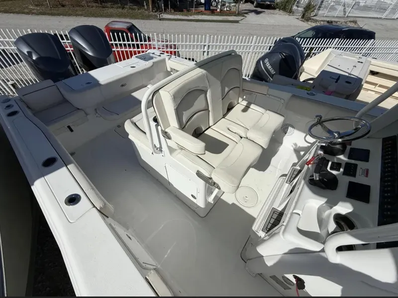 Slide: The Image of 2021 Sea Hunt Gamefish 30 boat with forward seating and dual outboard motors. - 4