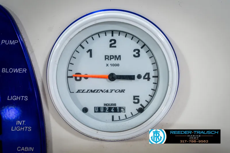 Slide: The Image of Close-up of 2001 Eliminator 26 Daytona RPM gauge, showing 4,000 RPM and 241.9 hours. - 26
