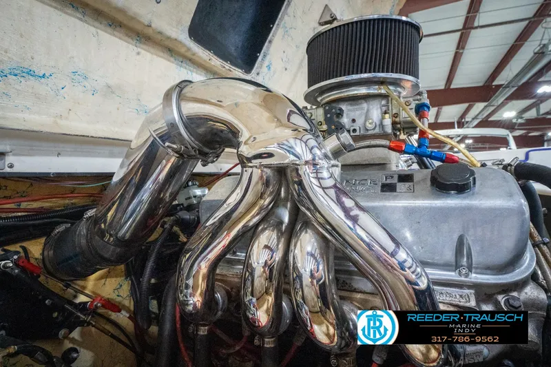 Slide: The Image of Engine of a 2001 Eliminator 26 Daytona boat with chrome exhaust headers. - 37