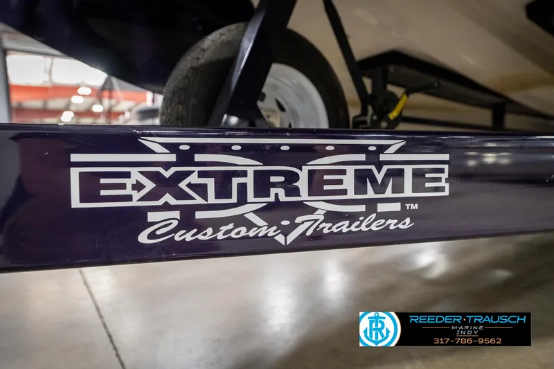 Slide: The Image of Extreme Custom Trailers logo on 2001 Eliminator 26 Daytona boat trailer. - 43