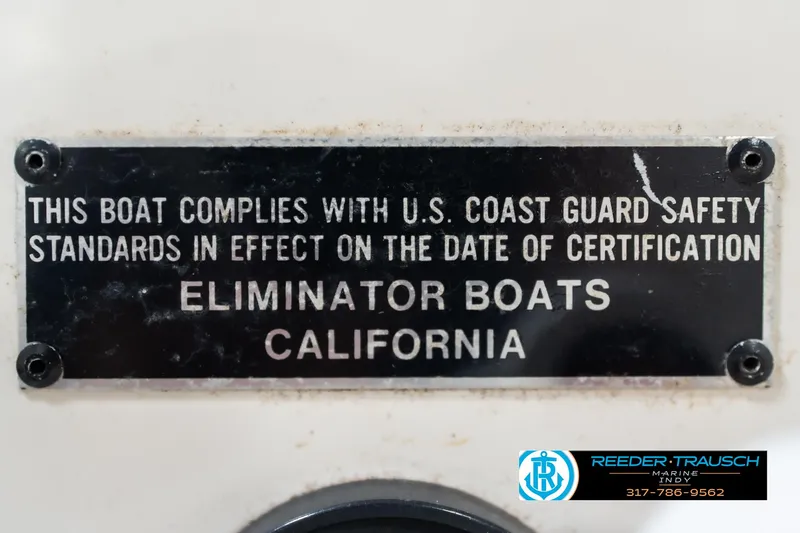 Slide: The Image of Plaque on 2001 Eliminator 26 Daytona boat, U.S. Coast Guard safety compliance. - 47