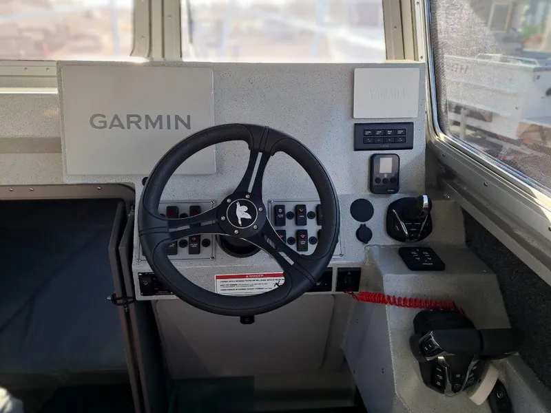 Slide: The Image of Helm of 2025 Duckworth 28 Offshore boat with Garmin navigation system. - 2
