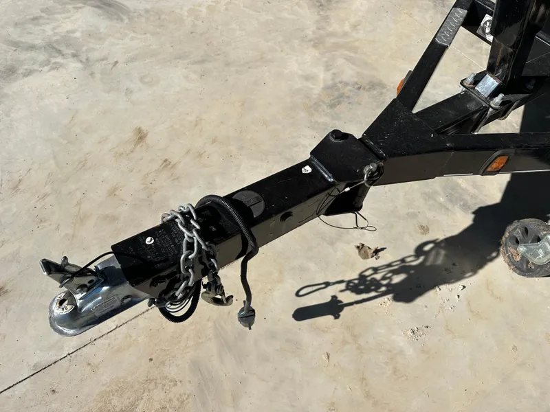 Slide: The Image of Trailer hitch of a 2015 Stingray 215 LR boat on concrete surface. - 6