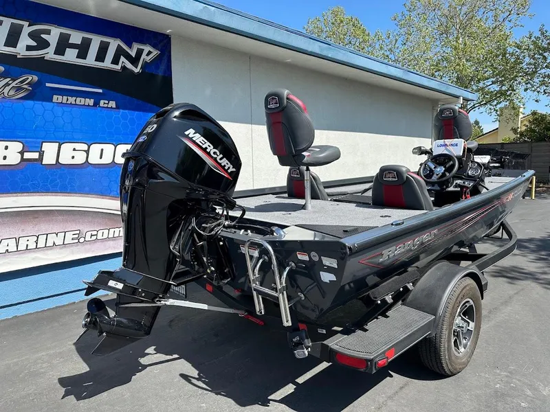 Slide: The Image of 2023 Ranger RT178 boat with Mercury engine, parked outdoors on a trailer. - 14