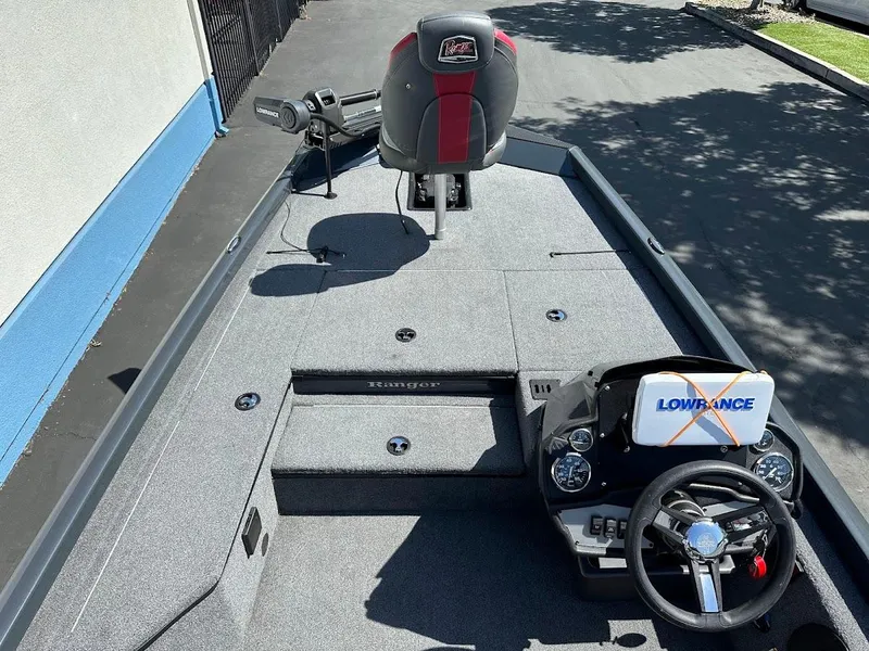 Slide: The Image of 2023 Ranger RT178 boat interior with Lowrance electronics and steering wheel. - 20