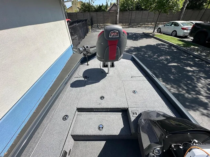 Slide: The Image of 2023 Ranger RT178 boat interior with seating and storage compartments. - 26