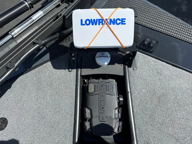 Slide: The Image of 2023 Ranger RT178 boat with Lowrance electronics on deck, featuring a secured display unit. - 29