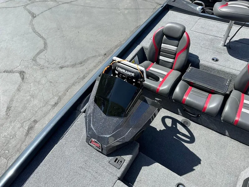 Slide: The Image of 2023 Ranger RT178 boat interior with Lowrance electronics and gray-red seating. - 32
