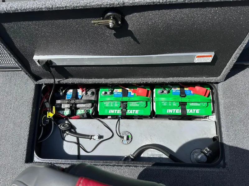 Slide: The Image of 2023 Ranger RT178 boat battery compartment with Interstate batteries. - 42
