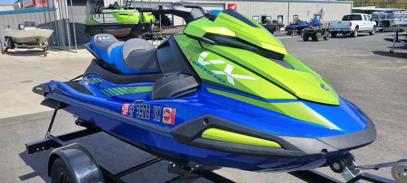 Slide: The Image of 2024 Yamaha Boats VX Limited HO in vibrant green and blue on a trailer. - 3