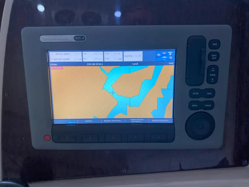 Slide: The Image of Navigation system on a 2009 Sea Ray 350 Sundancer boat dashboard. - 23