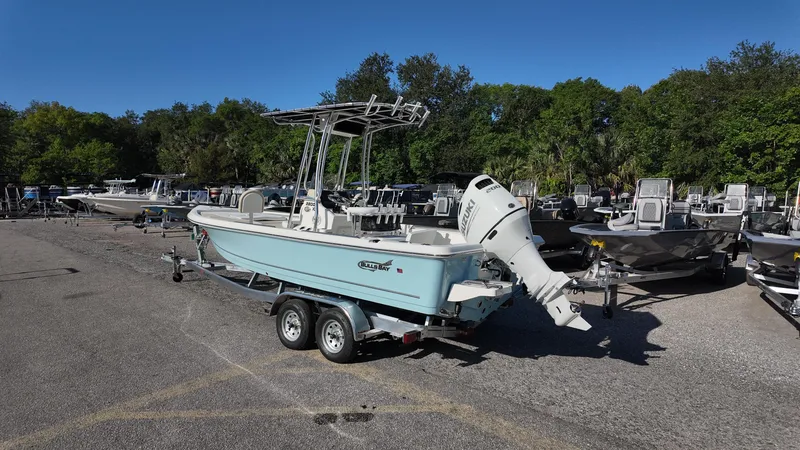 Slide: The Image of 2025 Bulls Bay 2200XS boat on trailer in outdoor lot. - 19