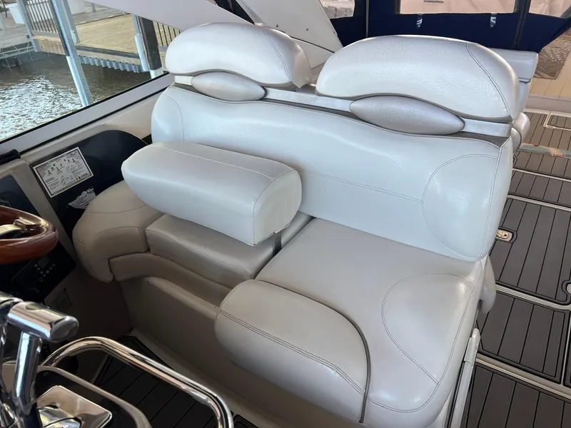 Slide: The Image of Luxurious white leather seating on 2004 Doral Boca Grande 36 boat interior. - 16