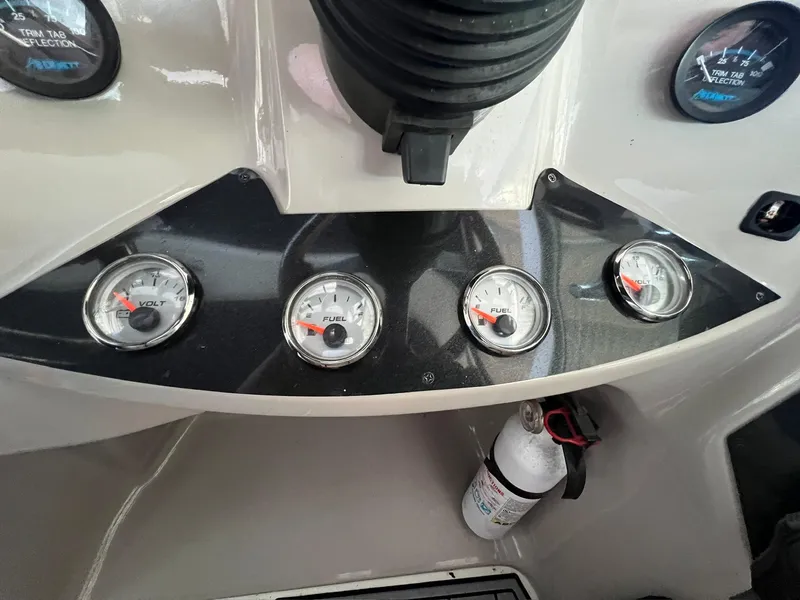 Slide: The Image of Dashboard of 2004 Doral Boca Grande 36 with gauges and fire extinguisher. - 7