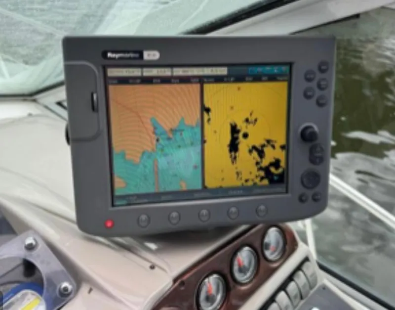 Slide: The Image of Raymarine GPS display on 2004 Doral Boca Grande 36 boat dashboard. - 8