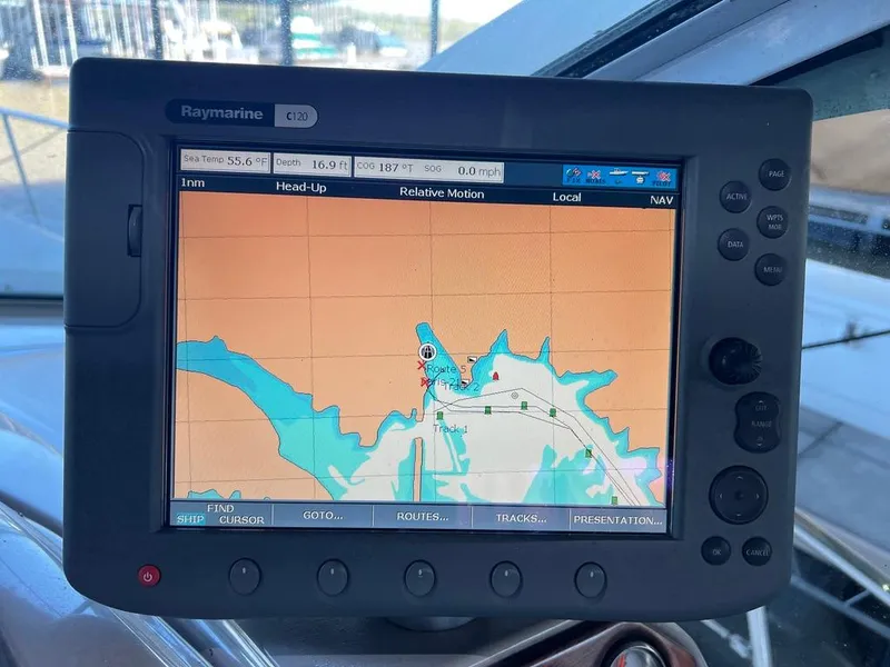 Slide: The Image of Raymarine C120 marine GPS displaying navigation map on a 2004 Doral Boca Grande 36 boat. - 9